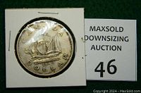 Front side of the 1949 Canadian Silver Dollar showing a sailing ship, date, and inscriptions.