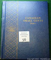 Blue hardcover Canadian Small Cents coin collection book from 1920, showing front cover with title and auction sticker.