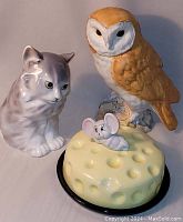 3 vintage items shown together: barn owl figurine, cheese server with mouse lid, and cat figurine.