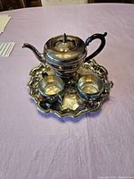 Complete Marlboro silver plated tea service set on lilac cloth
