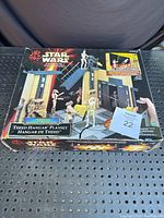 Box of Star Wars Episode I Theed Hangar Playset showing playset image and 2 figures in motorized setup