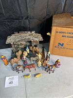 Full setup of vintage manger including all figurines and stable