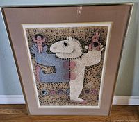Framed lithograph showing abstract stylized horse and human figures with detailed dot pattern background.
