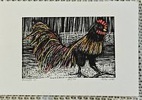 Front view of the woodblock print showing the rooster image with detailed line work and color accents