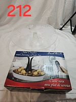 Nutcracker and serving dish set in original box with label and nutcracker visible on box top