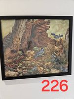 Framed art print showing woodland birds and nature scene in detail.