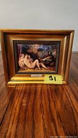 Full view of framed polysmalt print showing classical figures and gold-toned wooden frame.