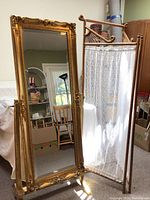 Mirror and lace screen displayed side by side