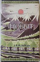 Front cover of 'The Hobbit' showing illustrated mountain landscape with sun and title text.