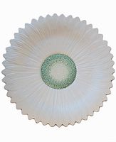 Top view of the sunflower plate showing cream petals and green textured center.