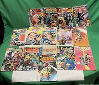 Full display of all 15 comics in the lot arranged in three rows with visible colorful covers and titles.