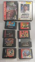 Photo showing all Sega Genesis cartridges and original cases for NHL Quarterback Club and Mario Andretti Racing.