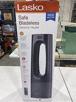 Front view of the Lasko Safe Bladeless Ceramic Heater box showing product image and key features in English.