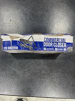 Top view of original box showing product name FH-8400H0B and 'Commercial Door Closer' text with image of door closer.