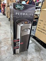 Full front view of the new Hunter PermaLife air purifier in sealed box, showing branding, model, and features