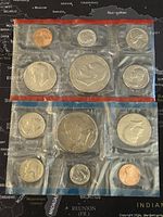 Two sealed 1976 US coin sets featuring proof-like finish coins commemorating Bicentennial.