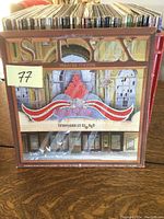 Photo showing Styx Paradise Theater Temporarily Closed LP cover with theater marquee and broken window artwork.