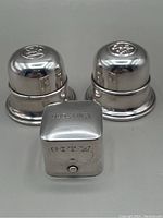 All three boxes displayed together: two dome boxes and one cube box