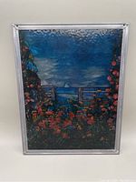 Front view of the stained glass effect panel showing the full seascape with flowers and ocean scene.