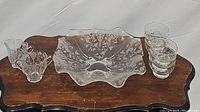 Cambridge Glass footed serving bowl, sugar and creamer dishes along with 6 vintage Anchor Hocking dessert/custard cups arranged on a wooden surface