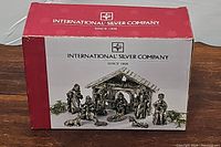 Box image showing International Silver Company branding and photo of the nativity set