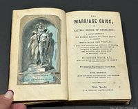 Open book showing color plate and title page with publication details.