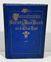 Front cover of the blue hardcover book with gilt title 'The Torontonian Society Blue Book and Club List 1921'.