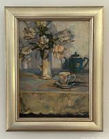 Front view of framed oil painting depicting still life.