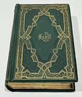 Front cover showing embossed green cloth with gilt decoration and the name "Scott" in gold lettering.