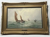 Frontal view of entire framed painting showing sailboats and ornate gilt frame