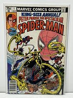 Front cover of Marvel Peter Parker: The Spectacular Spider-Man #1 King-Size Annual with cover art showing Spider-Man and Doctor Octopus.