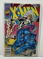 Front cover of Marvel X-Men #1 comic book showing main characters Storm, Beast, and others with the title and issue details visible.
