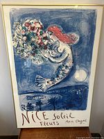 Front view of framed Nice Soleil Fleurs poster by Marc Chagall