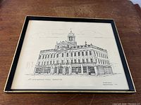 Framed black and white print of St. Lawrence Hall Market in Toronto, showing detailed architecture.