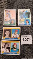 Four baseball cards from 1983 O-Pee-Chee including Fernando Valenzuela, Robin Yount, Jim Kaat, and Bruce Sutter in Super Veteran cards.