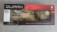 Front view of sealed Quark Infrared Mini Helicopter box with visible blue helicopter and controller inside, product branding and details on packaging.