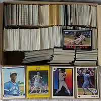 Box containing about 1700 Toronto Blue Jays baseball cards, stacked and organized, with some visible cards including Tony Fernandez and Jimmy Key.