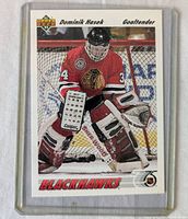 Front side of 1991-92 Upper Deck Dominik Hasek rookie card showing Hasek in goalie gear for Chicago Blackhawks.