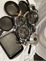 Frying pans, roasting pan, and Anolon pot set with glass lids