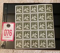 Full pane of 25 Canada 1965 Christmas 3 cent stamps displayed in a black mount, mint never hinged, very fine condition.