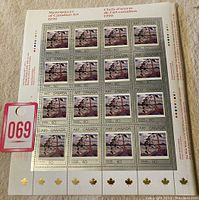 Full sheet of 16 mint never hinged Canada art stamps from 1990 featuring Tom Thomson's painting