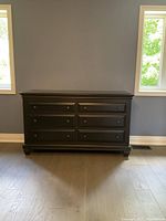 Front view of the six drawer dresser showing the espresso finish and drawer layout.