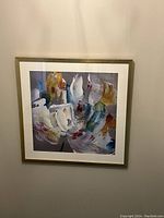 Front view of professionally framed abstract floral giclee print with thick brushstroke style and varied colors.