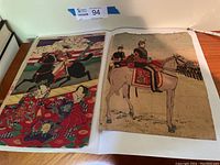 Overview of two woodblock prints side by side on a surface