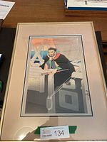 Full view of framed and matted Japanese woodblock print of sailor, measuring about 16 by 22 inches.