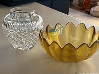 Both glass items on a flat surface, showing size comparison and details