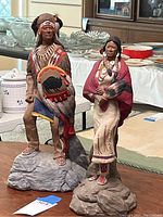 Two full figures posed together showing height and overall appearance