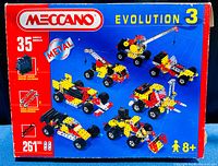 Front view of Meccano Evolution 3 box showing model examples and product details including 35 models, 261 parts, and metal construction.