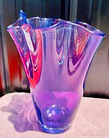 Front view of the violet Murano vase displaying the unique handkerchief shape and amethyst color.