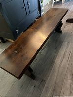 Full top view of bench showing plank-style top and surface scratches